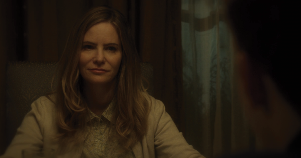 A screenshot of Amityville: The Awakening of Joan (Jennifer Jason Leigh)